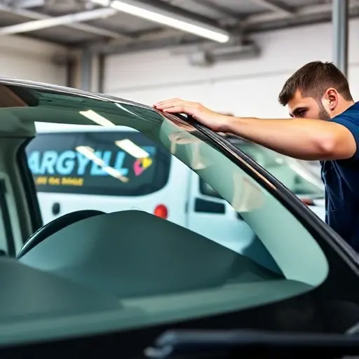 A close-up of a car's windshield being replaced in a professional auto glass repair shop, showing a technician carefully installing a new windshield on a vehicle with the Argyll logo visible on the service van or uniform, clean workshop environment, natural daylight, focus on precision and safety, no text or signage in the image